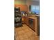 Kitchen with stainless steel appliances, and neutral colored cabinetry and countertops at 8913 Cambridge Glen Ct, Las Vegas, NV 89149