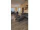 Inviting living room featuring modern furniture and hardwood style floors at 8913 Cambridge Glen Ct, Las Vegas, NV 89149