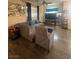The living room has a vaulted ceiling, a ceiling fan, and L-shaped couch at 8913 Cambridge Glen Ct, Las Vegas, NV 89149