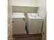 A laundry room equipped with a washing machine and dryer unit at 8982 Leaping Pad Ct, Las Vegas, NV 89148