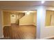 Open-concept living room with hardwood floors and plenty of natural light at 8982 Leaping Pad Ct, Las Vegas, NV 89148