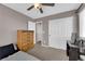 Bedroom with a ceiling fan, carpeted floors, and closet at 9082 Amanda Creek Ct, Las Vegas, NV 89149