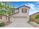 Charming two-story home featuring a two-car garage and low-maintenance landscaping at 9082 Amanda Creek Ct, Las Vegas, NV 89149
