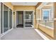 Outdoor balcony with sliding glass doors, offering a seamless transition between indoor and outdoor living spaces at 9125 Las Manaitas Ave # 302, Las Vegas, NV 89144