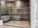 Contemporary bathroom showcasing a glass-enclosed shower with stylish tilework and modern fixtures at 9125 Las Manaitas Ave # 302, Las Vegas, NV 89144
