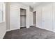 Bedroom with a closet and ensuite bathroom, featuring modern design and neutral colors at 9125 Las Manaitas Ave # 302, Las Vegas, NV 89144