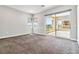 Spacious bedroom with sliding glass doors leading to a balcony and offering scenic views at 9125 Las Manaitas Ave # 302, Las Vegas, NV 89144