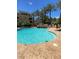 Stunning community pool with beautiful waterfall features and plenty of room for swimming at 9125 Las Manaitas Ave # 302, Las Vegas, NV 89144
