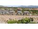 Beautiful condos overlooking pristine golf course with desert landscaping and a mountain view backdrop at 9125 Las Manaitas Ave # 302, Las Vegas, NV 89144