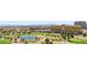 Overhead view of a picturesque golf course with a water feature and lush greenery at 9125 Las Manaitas Ave # 302, Las Vegas, NV 89144