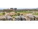 Panoramic view of condos, a golf course, desert landscape, and a luxurious resort in the background at 9125 Las Manaitas Ave # 302, Las Vegas, NV 89144