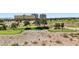 Scenic view of a well-maintained golf course with lush green fairways and mature trees in a desert landscape at 9125 Las Manaitas Ave # 302, Las Vegas, NV 89144