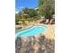 Relaxing hot tub surrounded by greenery offers a tranquil escape in this community at 9125 Las Manaitas Ave # 302, Las Vegas, NV 89144