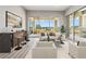 Cozy living room with modern furniture and sliding glass doors to balcony at 9125 Las Manaitas Ave # 302, Las Vegas, NV 89144