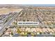 Overhead view of the community with homes, street, and landscape with desert hills in the background at 9362 Wilderness Glen Ave, Las Vegas, NV 89178