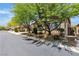 Charming single-story home featuring a well-maintained lawn, mature trees, and an attached two-car garage at 9362 Wilderness Glen Ave, Las Vegas, NV 89178