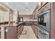 Well-equipped kitchen with stainless steel appliances and a large island at 9362 Wilderness Glen Ave, Las Vegas, NV 89178