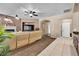 Relaxing living room that opens up to the entry and kitchen area, ideal for entertaining at 9362 Wilderness Glen Ave, Las Vegas, NV 89178