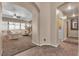 Comfortable living room with large windows and plush seating, perfect for relaxation at 9362 Wilderness Glen Ave, Las Vegas, NV 89178