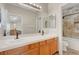 Bathroom with double sinks, and a shower/tub combination at 9704 Royal Lamb Dr, Las Vegas, NV 89145