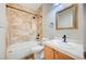 Cozy bathroom with decorative tile tub and shower at 9704 Royal Lamb Dr, Las Vegas, NV 89145