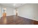 This is a bedroom leading to a bathroom and hardwood floors at 9704 Royal Lamb Dr, Las Vegas, NV 89145