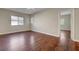 This is a bedroom with hardwood floors and natural light at 9704 Royal Lamb Dr, Las Vegas, NV 89145