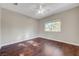 Bedroom with hardwood floors and natural light at 9704 Royal Lamb Dr, Las Vegas, NV 89145