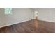 Bedroom featuring hardwood floors and natural light at 9704 Royal Lamb Dr, Las Vegas, NV 89145
