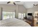 Large main bedroom with natural light, ensuite bathroom, and stylish furnishings at 9704 Royal Lamb Dr, Las Vegas, NV 89145