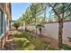 Backyard featuring a covered patio and desert landscaping at 10017 Snow Crest Pl, Las Vegas, NV 89134