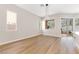 Dining area features hardwood floors and a view of the outdoor patio at 10017 Snow Crest Pl, Las Vegas, NV 89134