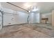 Spacious garage featuring a water heater and built-in cabinets at 10017 Snow Crest Pl, Las Vegas, NV 89134
