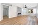 Bright living room features hardwood floors, a modern fireplace, and recessed lighting at 10017 Snow Crest Pl, Las Vegas, NV 89134