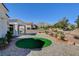 Backyard with desert landscaping, gravel, and mountain views, perfect for relaxation and outdoor enjoyment at 10100 Folsom Dr, Las Vegas, NV 89134