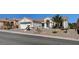 Charming single-story home with a well-manicured front yard and convenient driveway access at 10100 Folsom Dr, Las Vegas, NV 89134