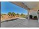Charming covered patio with scenic views of the surrounding desert landscape and mountains at 10100 Folsom Dr, Las Vegas, NV 89134