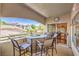 Charming balcony offers outdoor dining space with views of the neighborhood at 10109 Jacob Pl # 203, Las Vegas, NV 89144
