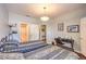 Comfortable bedroom with two beds, a desk, and artwork, offering a relaxing space at 10109 Jacob Pl # 203, Las Vegas, NV 89144