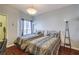 Cozy bedroom featuring twin beds, natural light, and tasteful decor at 10109 Jacob Pl # 203, Las Vegas, NV 89144
