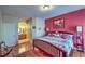 A well-lit primary bedroom provides ample space, featuring an ensuite bathroom and coordinated decor at 10109 Jacob Pl # 203, Las Vegas, NV 89144