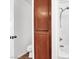 Bathroom with shower and toilet, including storage cabinet at 10230 Viterbo St, Las Vegas, NV 89183
