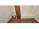 Bathroom featuring tub with shower, wooden cabinet, and toilet at 10230 Viterbo St, Las Vegas, NV 89183