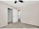 Bedroom features carpet, fan, and closet for storage at 10230 Viterbo St, Las Vegas, NV 89183