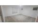 Bright bedroom boasts white walls, carpet, and ample natural light for a peaceful retreat at 10230 Viterbo St, Las Vegas, NV 89183