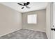 Bedroom with neutral walls, carpet flooring, and window at 10230 Viterbo St, Las Vegas, NV 89183