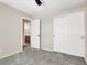 Spacious bedroom features carpet flooring and closet for storage at 10230 Viterbo St, Las Vegas, NV 89183