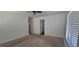 Large bedroom features neutral walls, plush carpet, and natural light perfect for relaxation at 10230 Viterbo St, Las Vegas, NV 89183