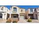 Charming two-story townhome featuring desert landscaping and an attached one car garage at 10230 Viterbo St, Las Vegas, NV 89183
