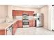 Well-lit kitchen featuring stainless steel appliances, and ample counter space at 10230 Viterbo St, Las Vegas, NV 89183